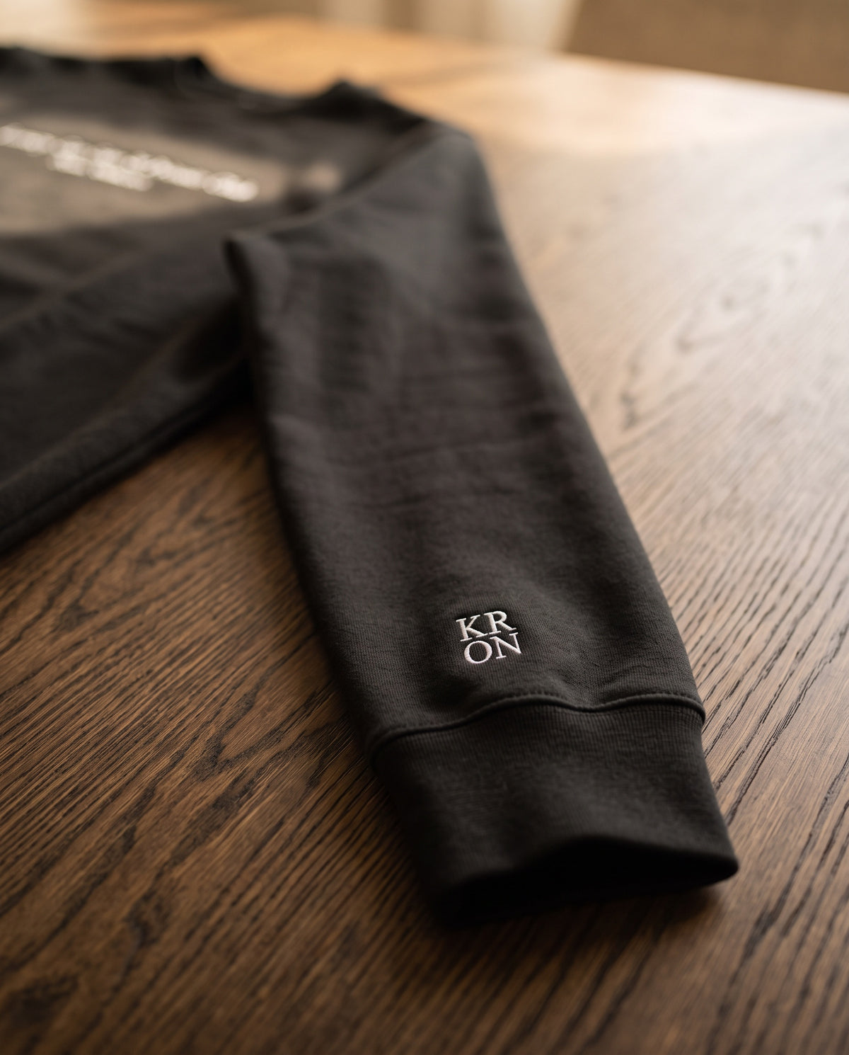 Heritage sweatshirt · cuff detail on oak
